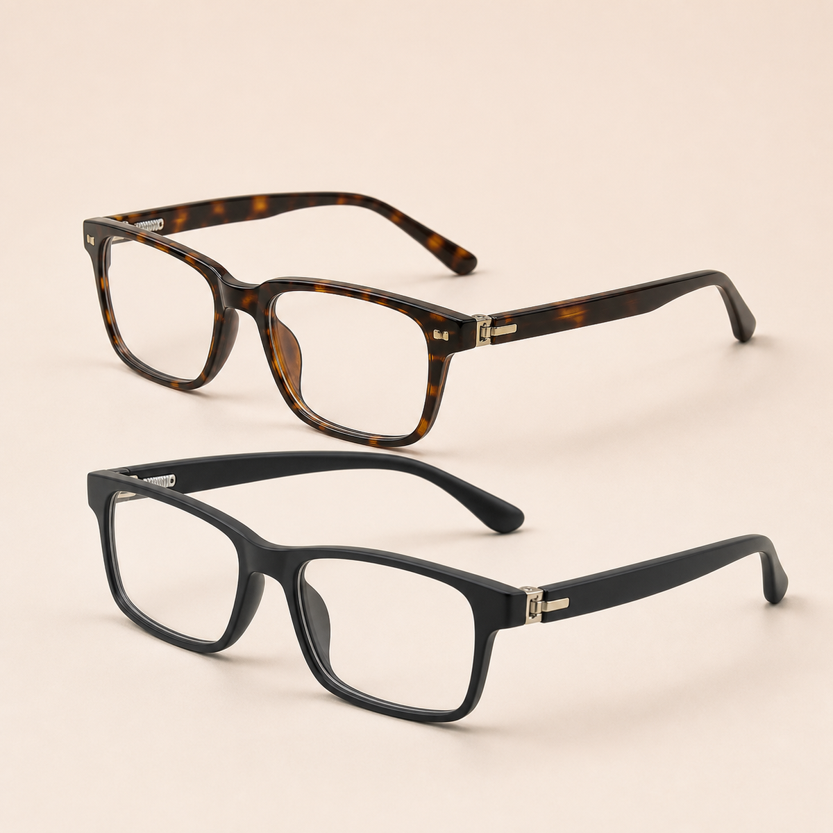 Spring-hinge reading glasses in tortoiseshell and black frames